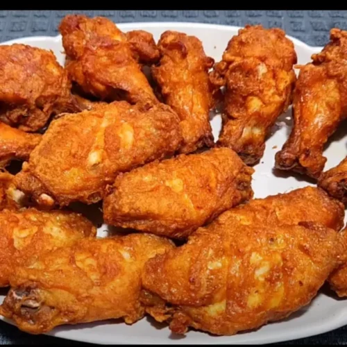 A pile of frozen chicken wings air fryer ready to be cooked